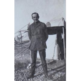 A soldier outside a tent