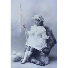 Girl sitting on a chair with a flag