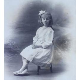 Girl sitting in a chair