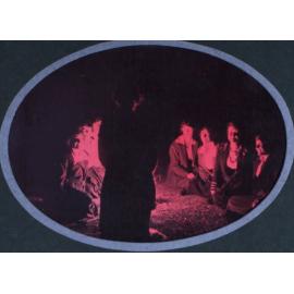 Women sitting around a fire