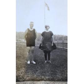 Unidentified man and woman in swimming bathers
