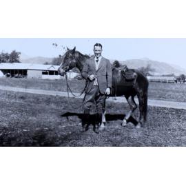 Unidentified man with a horse