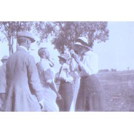 Unidentified group doing and egg and spoon race