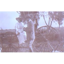 Unidentified couple and a buggy