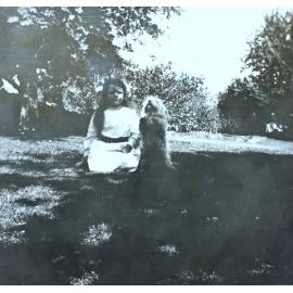 Young girl and a pet dog