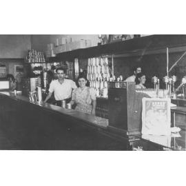 George Dedes and his sister, Katina, in the café in Moree, about 1947