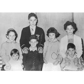 The Dedes children photographed at a Greek function, about 1963