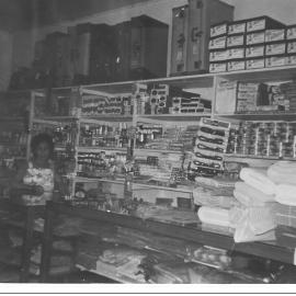 Inside Mary Chan's store showing types of goods sold