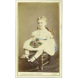 A hand-tinted carte-de-visite of a unidentified young girl