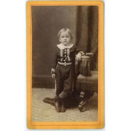 A carte-de-visite of an unidentified young boy, possibly a member of the Dutton family.