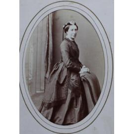 A carte-de-visite of a woman. The album page is annotated (in a modern hand) Mrs Margaret McIntyre
