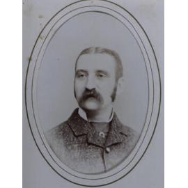 A carte-de-visite (on black board) of an unidentified man