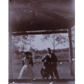 A photograph of an unidentified man, woman, and boy