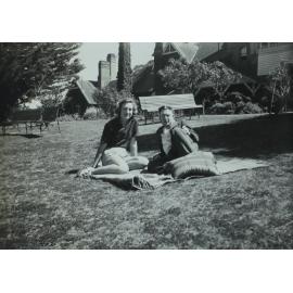 Students in the garden of Booloominbah - Betty Riley and Tom Harrigan. October 1940 NEUC