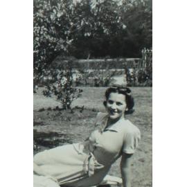 Woman sitting, Booloominbah gardens (NEUC)