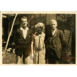 Charles Kingsford Smith and two unidentified people