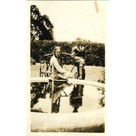 Kingsford Smith Album, A Boy and Girl in a Garden