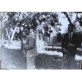 Male students [Max Hartwell (r) and Alf Maiden] in front of the deer park. 