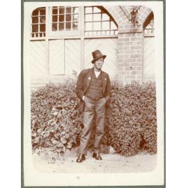 Man in three-piece suit and top hat