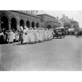 Voluntary Aid Detachment (VADs) march past Post Office, c. 1910