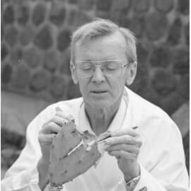 Professor Stuart Barker with a cactus, 1992