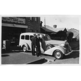 Ambulance and two officers outside Armidale District Station, Rusden Street, Armidale