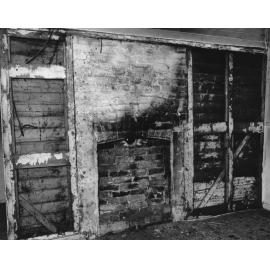 Interior view of a house in Markham Street before renovations