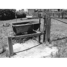 Hand pump to well at house in Markham Street before renovations