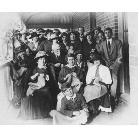 Group of people on verandah of "Sturry" - Sandbag Makers, 1914-1918 War