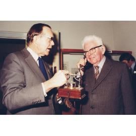 Sir Mark Oliphant and [Alex Lazenby or Milton Gooley ?]