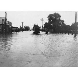 Flood in Beardy Street just below J. Richardson & Co. with the gas works on the right, 19 February 1928