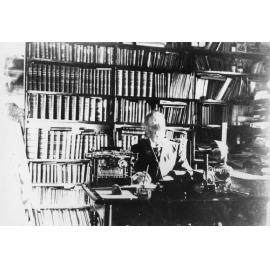 Henry Tonkin, headmaster of Hillgrove Public School 1888-1909, seated in his study, c. 1900