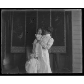 Woman with child and baby
