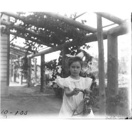 Girl on rocking horse, [1905]