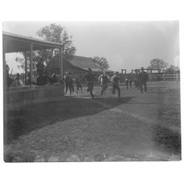 Footrace with male competitors and spectators