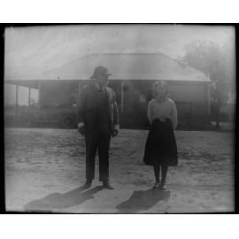 Man and woman standing outside