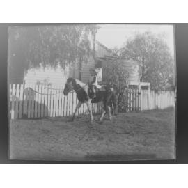 Georgie on Cubbie the pony, August 1906