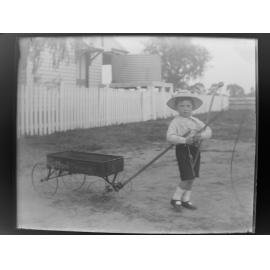 Boy pulling a wagon