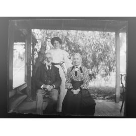 Barronga group sitting on a verandah 