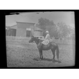 Girl riding a horse