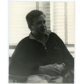 John Ryan seated