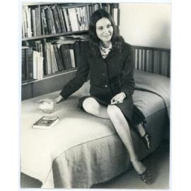 Female student in a dorm room