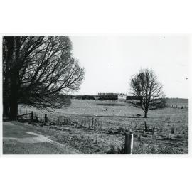 View towards Wright College construction site from the road, 1957