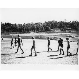 Wright College football players on a sporting field