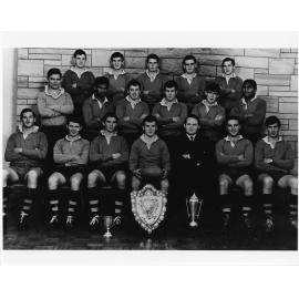 Wright College football team with shield