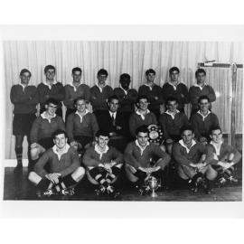 Wright College football team with cup and trophy