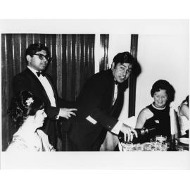 Wright College party, pouring drinks