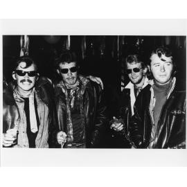 Wright College costume party, four men in leather jackets