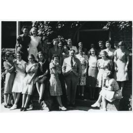 E.H. Booth with students