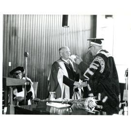 Sir Richard Lanne-Poole confers Honorary degree on Sir Albert Axon